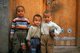 China: Three young Uighur boys with their football in the Old Town, Kashgar, Xinjiang Province