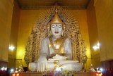 The Kyauktawgyi Temple was built during the reign of King Mindon Min (b. 1808 - 1878). The temple is renowned for its giant seated Buddha carved from a single block of pale green marble.<br/><br/>

Mandalay, a sprawling city of more than 1 million people, was founded in 1857 by King Mindon to coincide with an ancient Buddhist prophecy. It was believed that Gautama Buddha visited the sacred mount of Mandalay Hill with his disciple Ananda, and proclaimed that on the 2,400th anniversary of his death, a metropolis of Buddhist teaching would be founded at the foot of the hill.