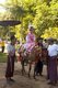 Burma / Myanmar: Young boy riding a horse and dressed in fine silks to symbolise Prince Siddhartha Gautama's departure from the royal palace. Shinbyu or Buddhist novitiation ceremony for young Burmese boys, Bagan (Pagan) Ancient City