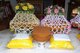 Thailand: Saffron robes, covered with elaborate decoration, and an alms bowl, ready for presentation to the <i>nak</i> or monks-to-be. Thai Buddhist ordination ceremony, Chiang Mai