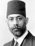 Choudhry Rahmat Ali (Urdu: چودھری رحمت علی‎) (16 November 1895 – 3 February 1951) was a Pakistani Muslim nationalist who was one of the earliest proponents of the creation of the state of Pakistan.<br/><br/>

He is credited with creating the name 'Pakistan' for a separate Muslim homeland in South Asia and is generally known as the founder of the movement for its creation.