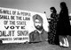 India: First Lok Sabha general election, Delhi, January 1952. Women voters reading an election poster for a Congress Party candidate