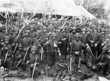 The Aceh War, also known as the Dutch War or the Infidel War (1873–1914), was an armed military conflict between the Sultanate of Aceh and the Netherlands which was triggered by discussions between representatives of Aceh and the United Kingdom in Singapore during early 1873.<br/><br/>

The war was part of a series of conflicts in the late 19th century that consolidated Dutch rule over modern-day Indonesia.<br/><br/>

The Korps Marechausse was extensively used by the Dutch to fight the Acehnese during the Aceh War. It was composed of Dutch, Sinyo (Indo-Dutch), Ambonese, Manado, Timorese and Javanese troops.