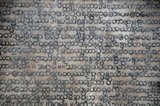 The entire Tipitaka Pali canon of Theravada Buddhism is set on 729 marble slabs, each with 80 to 100 lines of text, originally in gold ink, on both the obverse and the reverse sides. Each stone is three and a half feet wide, five feet tall and five inches thick and housed in a kyauksa gu or a small cave-like stupa.<br/><br/>

Kuthodaw Pagoda, literally meaning Royal Merit Pagoda, and formally titled Mahalawka Marazein, is a Buddhist temple and stupa located in Mandalay, central Burma. It lies at the foot of Mandalay Hill and was built during the reign of King Mindon (1808—78). The stupa itself, which is gilded above its terraces, is 57 m (188 ft) high, and is modelled after the Shwezigon Pagoda at Nyaung-U near Bagan. In the grounds of the pagoda are 729 'kyauksa gu' or stone-inscription caves, each containing a marble slab inscribed on both sides with a page of text from the Tipitaka, the entire Pali Canon of Theravada Buddhism. The stone inscriptions are considered to be the largest book in the world.<br/><br/>

Mandalay, a sprawling city of more than 1 million people, was founded in 1857 by King Mindon to coincide with an ancient Buddhist prophecy. It was believed that Gautama Buddha visited the sacred mount of Mandalay Hill with his disciple Ananda, and proclaimed that on the 2,400th anniversary of his death, a metropolis of Buddhist teaching would be founded at the foot of the hill.