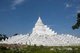 The Hsinbyume Pagoda was built in 1816 by King Bagyidaw (1784 - 1846), the seventh king of the Konbaung Dynasty. He built it for his first wife, Princess Hsinbyume who died in childbirth in 1812. The pagoda is also known as the Myatheindan Pagoda.<br/><br/>

The pagoda's design is based on the mythical Sulamani Pagoda found on Mount Meru, with the seven lower concentric terraces representing the mountain ranges leading to Mount Meru.