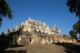 The Maha Aung Mye Bonzan Monastery was built in 1822 by Nanmadaw Me Nu, the first queen of King Bagyidaw (1784 - 1846).<br/><br/>

Inwa was the capital of Burma for nearly 360 years, on five separate occasions, from 1365 to 1842. So identified as the seat of power in Burma that Inwa (as the Kingdom of Ava, or the Court of Ava) was the name by which Burma was known to Europeans down to the 19th century.