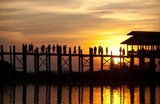 The U Bein Bridge is the longest teakwood bridge in the world and was constructed around 1850 from the abandoned teak columns of the old Ava (Inwa) Palace.