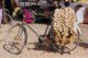 China: Strings of garlic on the back of a bicycle at the Sunday Market, Kashgar, Xinjiang Province