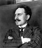 Karl Liebknecht (13 August 1871 – 15 January 1919) was a German socialist and a co-founder with Rosa Luxemburg of the Spartacist League and the Communist Party of Germany. He is best known for his opposition to World War I in the Reichstag and his role in the Spartacist uprising of 1919.<br/><br/>

The uprising was crushed by the social democrat government and the Freikorps (paramilitary units formed of World War I veterans). Liebknecht and Luxemburg were killed.<br/><br/>

After their deaths, Karl Liebknecht and Rosa Luxemburg became martyrs for German left wing politics.