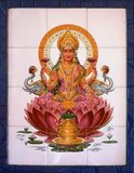 Lakshmi is the Hindu goddess of wealth, love, prosperity (both material and spiritual), fortune, and the embodiment of beauty. She is the wife and active energy of Vishnu. Her four hands represent the four goals of human life considered proper in Hindu way of life – dharma, kama, artha, and moksha.<br/><br/>

Representations of Lakshmi are also found in Jain monuments. In Buddhist sects of Tibet, Nepal and southeast Asia, goddess Vasudhara mirrors the characteristics and attributes of Hindu goddess Lakshmi, with minor iconographic differences.<br/><br/>

Kandy is Sri Lanka's second biggest city with a population of around 170,000 and is the cultural centre of the whole island. For about two centuries (until 1815) it was the capital of Sri Lanka.