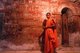 Sri Lanka: A monk in front of murals at Degaldoruwa Temple, near Kandy