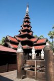 The Bagaya Monastery is constructed entirely of teak wood and was built ib 1834 CE, during the reign of King Bagyidaw (1784 - 1846).<br/><br/>

Inwa was the capital of Burma for nearly 360 years, on five separate occasions, from 1365 to 1842. So identified as the seat of power in Burma that Inwa (as the Kingdom of Ava, or the Court of Ava) was the name by which Burma was known to Europeans down to the 19th century.