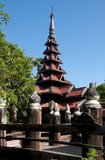 The Bagaya Monastery is constructed entirely of teak wood and was built ib 1834 CE, during the reign of King Bagyidaw (1784 - 1846).<br/><br/>

Inwa was the capital of Burma for nearly 360 years, on five separate occasions, from 1365 to 1842. So identified as the seat of power in Burma that Inwa (as the Kingdom of Ava, or the Court of Ava) was the name by which Burma was known to Europeans down to the 19th century.