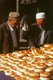China: Buying bread in a market in old Kashgar, Xinjiang Province
