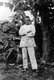 France / Ethiopia: Arthur Rimbaud (1854 - 1891) standing in front of a tree in Harar. Self-portrait, c. 1883