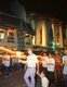 Thailand: A procession of Thai Buddhists holding candles and circumambulating the viharn at Wat Suthat, Bangkok, for the Visakha Puja Festival