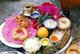 Nepal: Various sweets, rice, fruit and flowers used as ritual offerings at a temple in Kathmandu