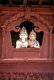 Nepal: The divine couple, the Hindu gods Shiva and Parvati, gaze down from a window in the Shiva Parvati Temple, Durbar Square, Kathmandu