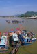 Vietnam: Fishing boats in the harbour, with the Po Nagar Cham Towers on the hill in the background, Nha Trang, Khanh Hoa Province