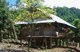 Vietnam: A typical Tai house in a small White Tai village near Chan Nua, 30 km south of Pa Tan, Lai Chau,  NW Vietnam