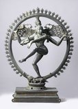 Nataraja or Nataraj ('The Lord - or King - of Dance'; Tamil: Kooththan) is a depiction of the Hindu god Shiva as the cosmic dancer Koothan who performs his divine dance to destroy a weary universe and make preparations for god Brahma to start the process of creation. <br/><br/>

A Tamil concept, Shiva was first depicted as Nataraja in the famous Chola bronzes and sculptures of Chidambaram. The dance of Shiva in Tillai, the traditional name for Chidambaram, forms the motif for all the depictions of Shiva as Nataraja. He is also known as 'Sabesan' in Tamil which means 'The Lord who dances on a dais'. The form is present in most Shiva temples in South India, and is the main deity in the famous temple at Chidambaram. <br/><br/>

The sculpture is usually made in bronze, with Shiva dancing in an aureole of flames, lifting his left leg (and in rare cases, the right leg) and balancing over a demon or dwarf (Apasmara) who symbolizes ignorance. It is a well known sculptural symbol in India and popularly used as a symbol of Indian culture. <br/><br/>

The two most common forms of Shiva's dance are the Lasya (the gentle form of dance), associated with the creation of the world, and the Tandava (the violent and dangerous dance), associated with the destruction of weary worldviews - weary perspectives and lifestyles. In essence, the Lasya and the Tandava are just two aspects of Shiva's nature; for he destroys in order to create, tearing down to build again.