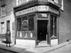 England, UK: Quong Yuen Sing's general provisions shop at 53, Pennyfields and the corner of Turner's Buildings, Limehouse, east London, c. 1925