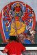 Nepal: A woman visits a shrine dedicated to the Hindu goddess Kali with her lion mount, Kathmandu