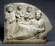 Syria: A funerary tablet or gravestone depicting a banquet. Limestone, Palmyra, 2nd-3rd century CE
