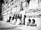 The Western Wall, Wailing Wall or Kotel ( Arabic: Ha'it Al-Buraq, ' The Buraq Wall') is located in the Old City of Jerusalem.<br/><br/>

It is a relatively small western segment of the walls surrounding the area called the Temple Mount (or Har Habayit) by Jews, Christians and most Western sources, and known to Muslims as the Noble Sanctuary (Al-Haram ash-Sharif).