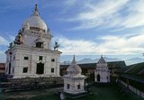 The Moghul-style Kal Mochan Temple was built in !874 by the then Prime Minister of Nepal, Bhimsen Thapa (1775 - 1839).<br/><br/>

Bhimsen rose to power by initially serving as a bodyguard and personal secretary of King Rana Bahadur Shah. Bhimsen had accompanied Rana Bahadur Shah to Varanasi after his abdication and subsequent exile in 1800. In Varanasi, Bhimsen helped Rana Bahadur engineer his return to power in 1804. In gratitude, Rana Bahadur made Bhimsen a kaji (equivalent to a minister) of the newly formed government.<br/><br/>

Rana Bahadur's assassination by his step brother in 1806 led Bhimsen to massacre ninety-three people, after which he was able to claim the title of the mukhtiyar (equivalent to prime minister).