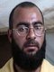 Iraq: Mugshot of Abu Bakr al-Baghdadi  (1971 - ), born Ibrahim Awwad Ibrahim Ali Muhammad al-Badri al-Samarrai, taken by US armed forces while he was held in detention at Camp Bucca, Umm Qasr, in 2004