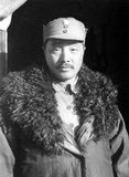 He Long (Wade–Giles: Ho Lung; March 22, 1896 – June 8, 1969) was a Chinese military leader. He was from a poor rural family of a minority ethnic group in Hunan, and his family was not able to provide him with any formal education. He began his revolutionary career after avenging the death of his uncle, when he fled to become an outlaw and attracted a small personal army around him. Later his forces joined the Kuomintang, and he participated in the Northern Expedition.<br/><br/>

He joined the Long March in 1935, over a year after forces associated with Mao Zedong and Zhu De were forced to do so. After settling and establishing a headquarters in Shaanxi, He led guerrilla forces in Northwest China in both the Chinese Civil War and the Second Sino-Japanese War, and was generally successful in expanding areas of Communist control. He commanded a force of 170,000 troops forces by the end of 1945, when his force was placed under the command of Peng Dehuai and He became Peng's second-in-command. He was placed in control of Southwest China in the late 1940s, and spent most of the 1950s in the Southwest administering the region in both civilian and military roles.<br/><br/>

He held a number of civilian and military positions after the founding of the People's Republic of China in 1949. In 1955 He's contributions to the victory of the Communist Party in China were recognized when he was named one of the Ten Marshals, and he served as China's vice premier. He did not support Mao Zedong's attempts to purge Peng Dehuai in 1959 and attempted to rehabilitate Peng. After the Cultural Revolution was declared in 1966, He was one of the first leaders of the PLA to be purged. He died in 1969 when a glucose injection provided by his jailers complicated his untreated diabetes.