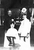 Gobulo Wan Rong ('Beautiful Countenance') was the daughter of Rong Yuan, the Minister of Domestic Affairs of the Qing Government and head of one of Manchuria's most prominent, richest families. At the age of 17, Wan Rong was selected from a series of photographs presented to the Xuan Tong Emperor (Puyi). The wedding took place when Puyi reached the age of 16. Wan Rong was the last Empress Consort of the Qing Dynasty in China, and later Empress of Manchukuo (also known as the Manchurian Empire). Empress Wan Rong died of malnutrition and opium addiction in prison in Jilin.<br/><br/>

Sir Reginald Fleming Johnston, KCMG, CBE (13 October 1874–6 March 1938) was a Scottish academic and diplomat who served as the tutor and advisor to Puyi, the last Emperor of China and as the last colonial governor of Weihaiwei.<br/><br/>

Isabel Ingram (Mayer) (1902–1988) was an American tutor of Wan Rong, Empress and wife of the last emperor of China.