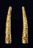 Western descriptions of Chinese emperors, royalty and nobles often mention fingernails long enough to mark the person above any possibility of manual labor. These fingernail protectors, or guards, might be worn as a single jewel on the hand or in multiple sets.<br/><br/>

According to the San Diego Museum of Art: 'Fingernail protectors were worn by a very elite group–Manchu court ladies of the late Qing dynasty. Although scholars of Chinese costumes usually date fingernail protectors to the Qing dynasty, they are in fact characteristic only of the late 19th century. Portraits of early Qing court ladies show natural fingernails. Late Qing rulers, however, pursued a life of absolute luxury. For example, photographs and portraits of Empress Jixi (1835-1908) show her wearing two or three nail shields on each of her hands–a sign of her ability to rely upon servants to carry out any of her wishes, as she herself could perform no manual tasks'.<br/><br/>

The wearing of fingernail protectors was specifically associated with the Manchurian high culture of the Qing Dynasty. Han men were forced by law to wear Manchu clothing and to groom themselves by Manchu custom, whereas Han women were free to continue wearing traditional Han fashions. Manchu women felt that long fingernails were a status symbol they protected with fingernail covers that might be finely carved and inlayed with gold silver and gem.