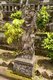 Indonesia: A stone figure from the Hindu epic Ramayana at the entrance to the 19th century Pura Meduwe Karang Hindu temple, Kubutambahan, northern Bali