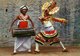 Sri Lanka: Traditional Ruhunu dancer with mask and a drummer with his Yak Bera drum