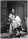China: A young Manchu woman in traditional dress, Beijing, 1860s