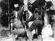 Israel / Palestine: Palestinian Muslim elders searched in a Jerusalem street by Israeli forces, 1948