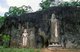 Sri Lanka: 1000 year old carved stone figures representing a 16m Buddha (right) and to the left three smaller figures representing the Avalokitesvara (centre) and his consort Tara (right), and their son Prince Sudana, Buduruvagala