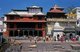Nepal: A wrapped body awaits cremation at Arya Ghat (Steps of the Nobles), Pashupatinath, Kathmandu