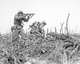 Japan / USA: A US Marine from the 2nd Battalion, 1st Marines on Wana Ridge firing a Thompson submachine gun. Battle of Okinawa, May 1945