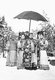 China: The Empress Dowager Cixi (1835-1908) accompanied by female attendants in a snowy palace garden, c. 1905