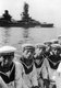 Japan: Crew members of the Japanese battleship Fuso moored in the background, Kure, Hiroshima, May 1943
