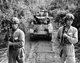 Burma / Myanmar / China: A mechanized unit of Chinese soldiers of the Kuomintang’s (KMT) National Revolutionary Army head to the Siege of Bhamo in American-made M3 Stuart light tanks. Kachin State, November 1944.
