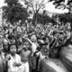 Singapore: Children in Singapore cheer the arrival of the 5th Indian Division following the Allied liberation of Singapore from the Japanese, 5 September 1945