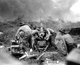 Indonesia: Australian soldiers of the Second Australian Imperial Force use a 25-pounder field gun to pound Japanese positions during the Battle of Balikpapan, Borneo, Dutch East Indies (now part of East Kalimantan), July 1945