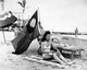 USA / China: Ruth Lee, an American woman of Chinese descent, displays the flag of the Republic of China while she sunbathes so that other beach-goers do not mistake her for a Japanese. Florida, 15 December 1941