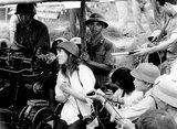Jane Fonda visited Hanoi in July 1972. Among other statements, she repeated the North Vietnamese claim that the United States had been deliberately targeting the dike system along the Red River. In fact the dike system suffered bomb damage, but was not strategically targeted.<br/><br/>

In North Vietnam, Fonda was photographed seated on an anti-aircraft battery. In her 2005 autobiography, she writes that she was manipulated into sitting on the battery, and was immediately horrified at the implications of the pictures. After the release of the pictures of Fonda seated behind the anti-aircraft gun, she was dubbed 'Hanoi Jane' by opponents of the anti-war movement in the United States.