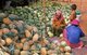 Cambodia: Pineapples and watermelons piled high at a market in Skuon, central Cambodia