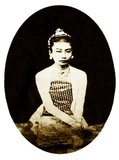 Supayalat (13 December 1859 – 24 November 1925) was the last queen of Burma who reigned in Mandalay (1878–1885), born to King Mindon Min and Queen Alenandaw. Their reign lasted just seven years when Thibaw Min was defeated in the Third Anglo-Burmese War and forced to abdicate by the British in 1885. On 25 November 1885 they were taken away in a covered carriage, leaving Mandalay Palace by the southern gate of the walled city along the streets lined by British soldiers and their wailing subjects, to the River Irrawaddy where a steamboat awaited. Thibaw was 27 and Supayalat 26.<br/><br/>

After years of exile in India, Supayalat returned to Rangoon in 1919. She died six years later, in 1925 - shortly before her 66th birthday. Although the colonial government declared the day of her funeral a national holiday, the royal family's request for her to be buried in Mandalay was also refused. Her funeral was, however, held with pomp and ceremony as befitted a Burmese queen.<br/><br/>

Supayalat lies buried at the foot of the Shwedagon Pagoda in Kandawmin Gardens between the tombs of Aung San Suu Kyi's mother Khin Kyi and the former UN Secretary General U Thant. Pictures From History